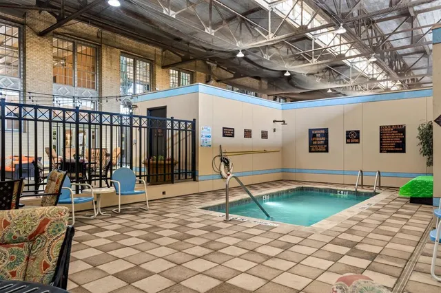 a building outdoor space with lots of furniture and chairs