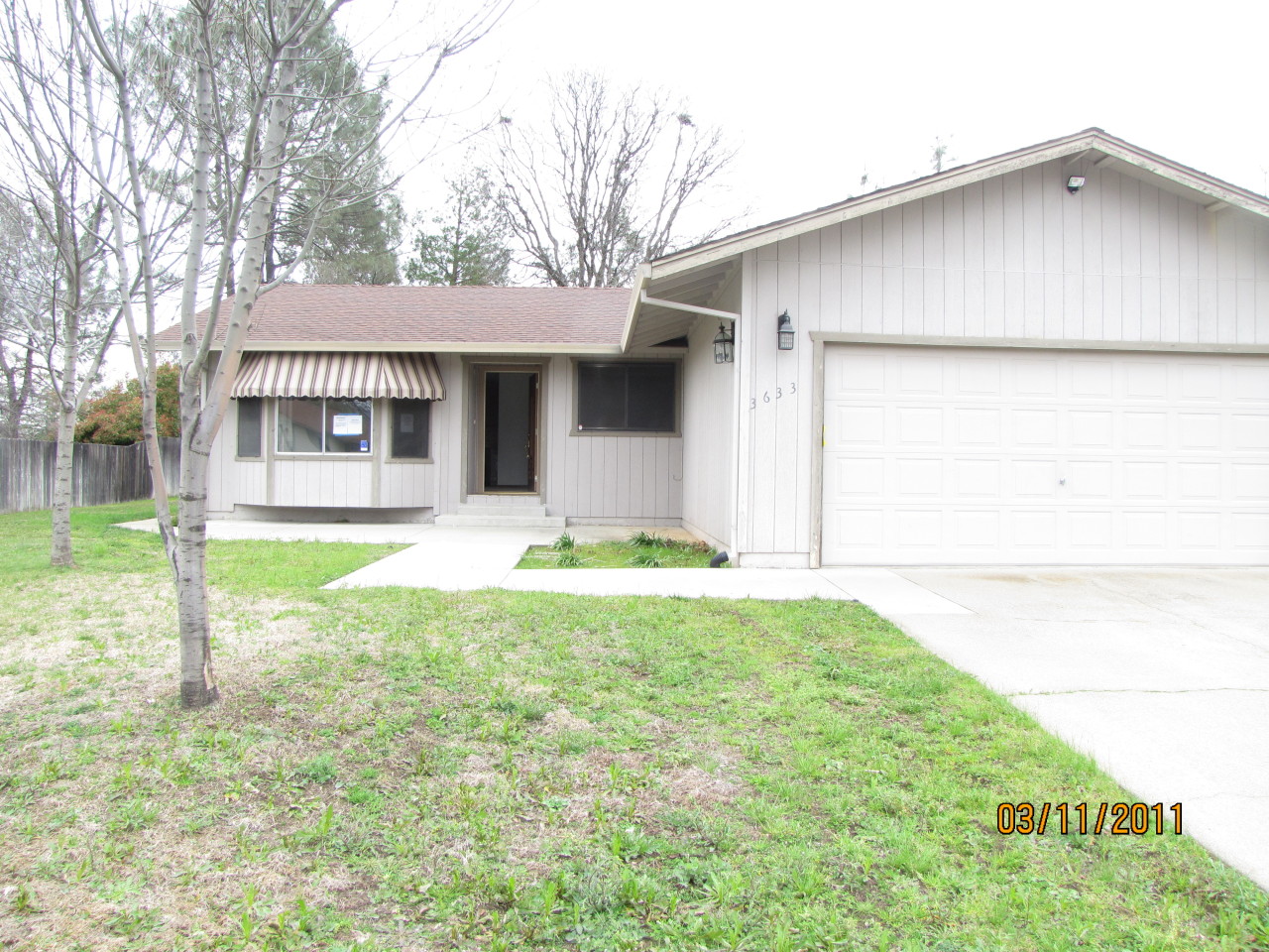 3633 Santa Rosa Way Redding, CA 96003 - Photo 1 of 1 a house that has garden in front of it