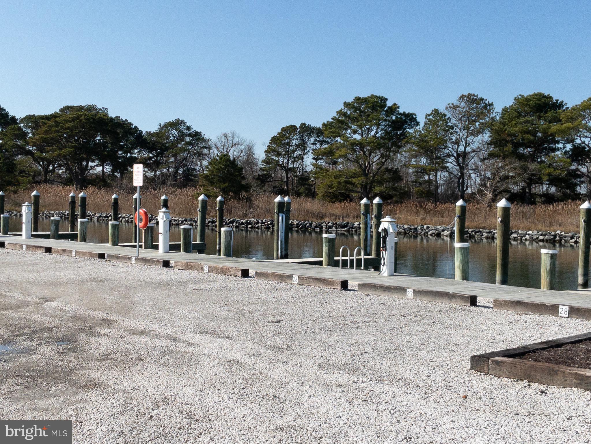 0 Dukes Road Girdletree, MD 21829 - Photo 9 of 11 a group of people sitting in a yard in front of building