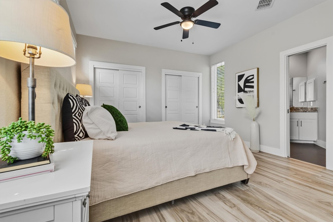 5609 Tura Lane, Unit A Austin, TX 78721 - Photo 5 of 38 You'll enjoy the dual closets in the primary.