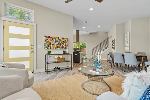 a living room with furniture and a table