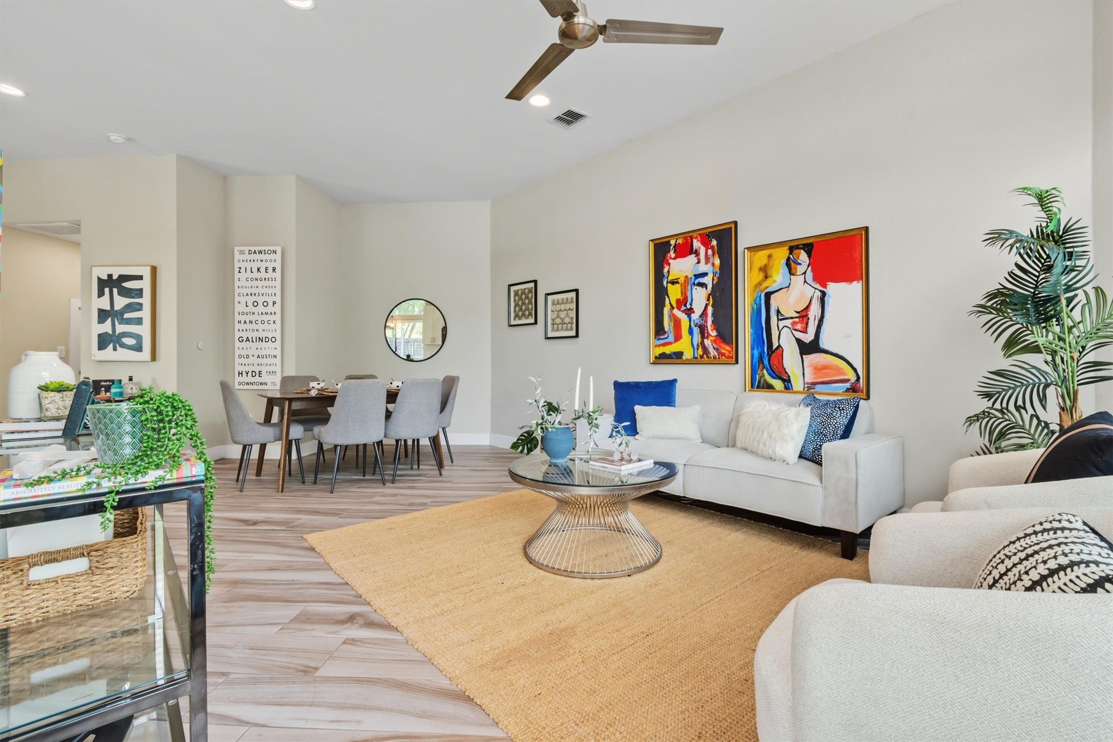 5609 Tura Lane, Unit A Austin, TX 78721 - Photo 10 of 38 Throughout the home, you'll find warm, neutral wood-look tile flooring.