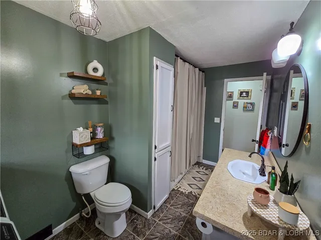 $325,000 | 11237 Wildwood Drive, Versailles, MO 65084