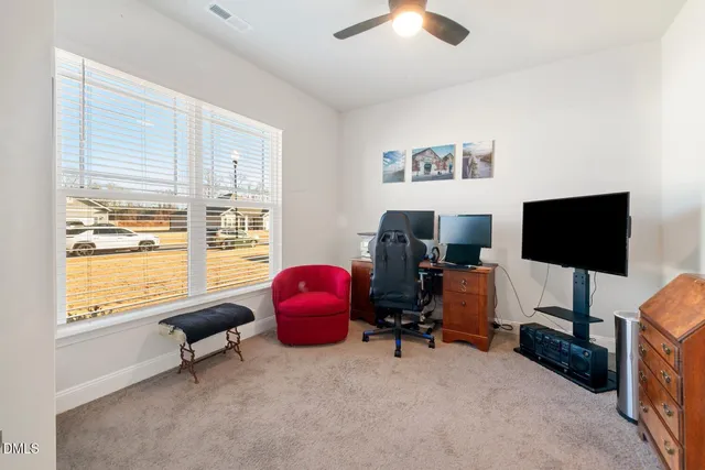 a house with yard in front of it