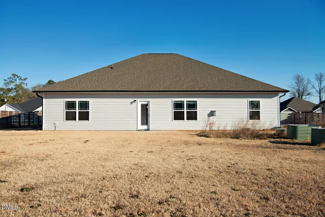 a front view of house with yard