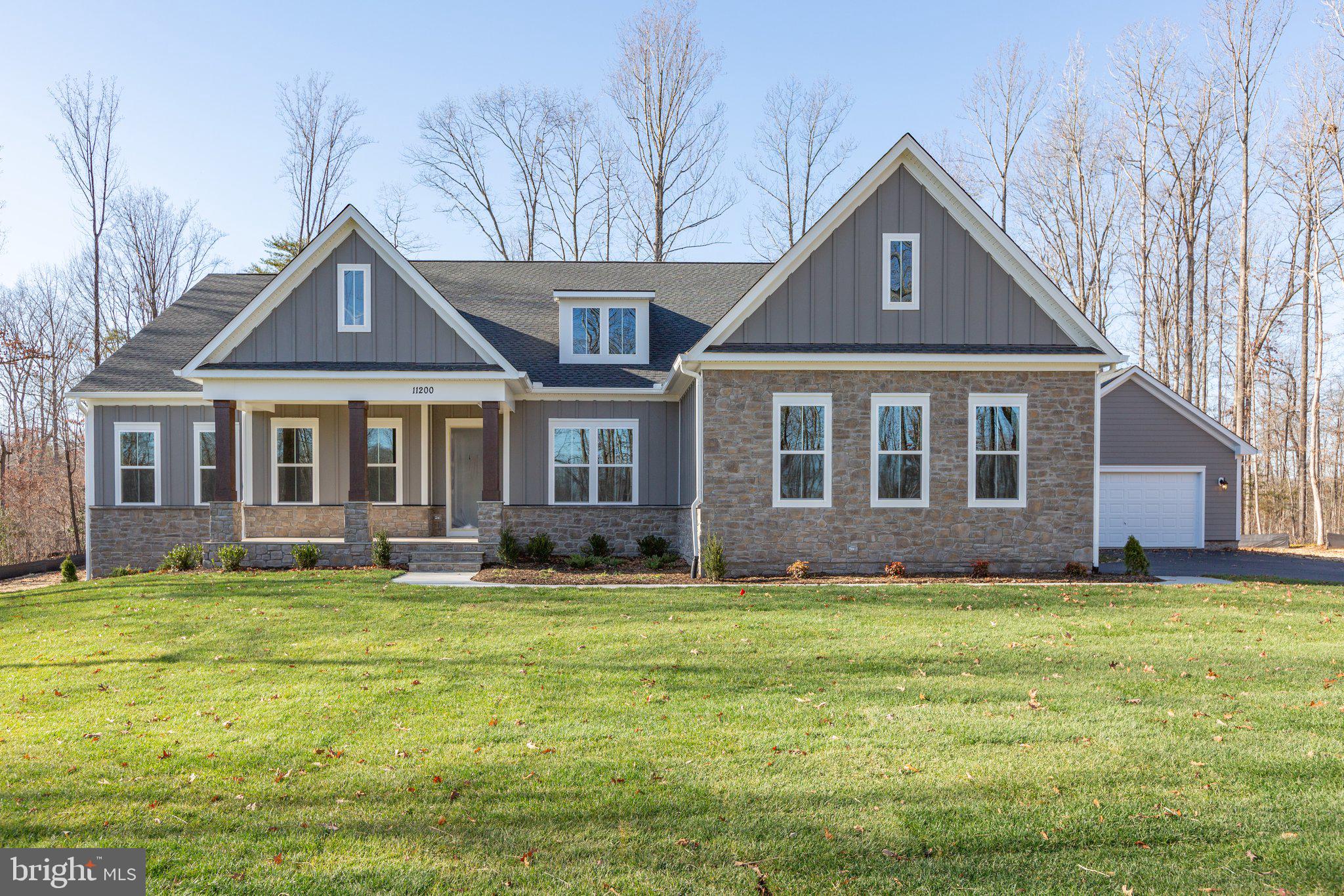 10 Burwell Road Nokesville, VA 20181 - Photo 1 of 57 a front view of a house with a yard