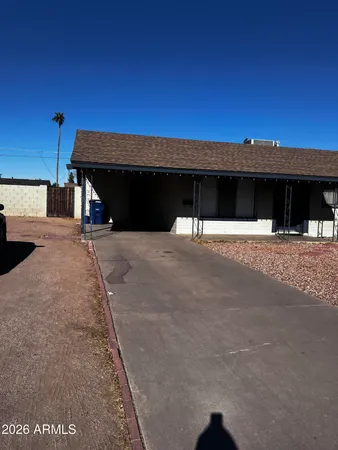 a view of a building with a street