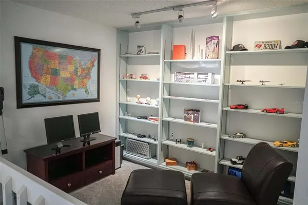 a bathroom with a toilet a sink and a mirror