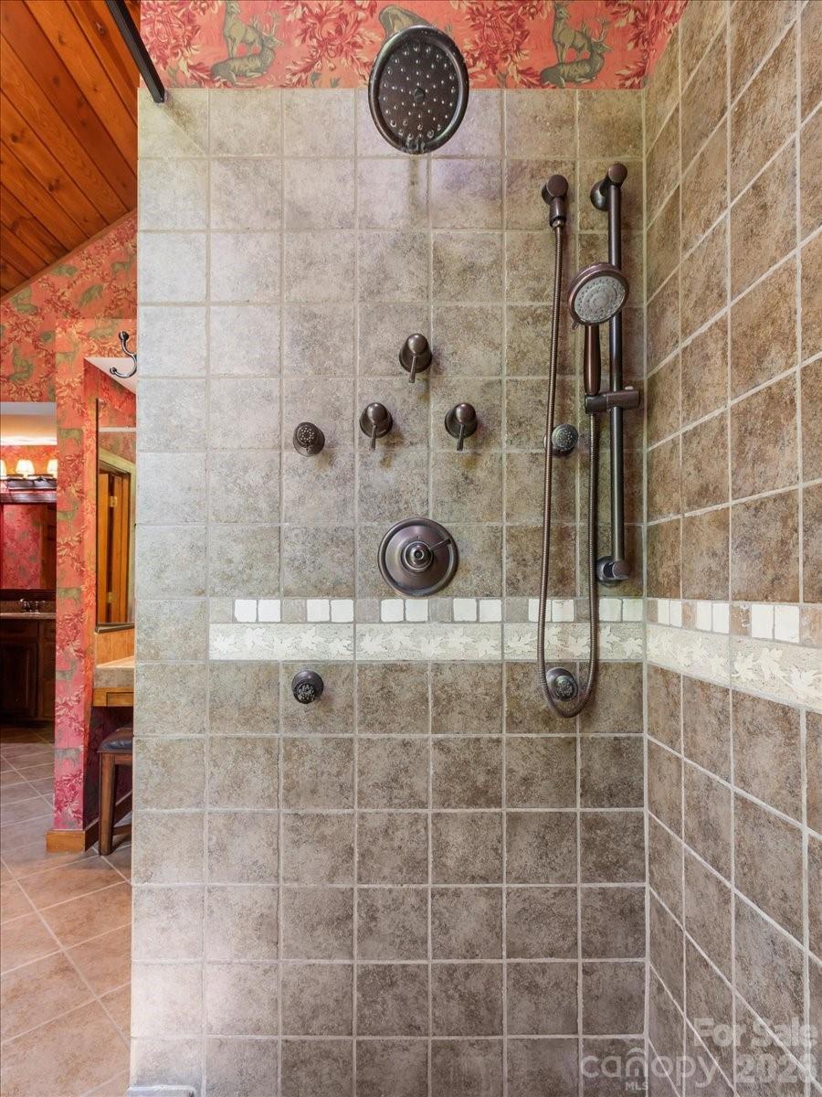 121 Ivy Ridge Road Burnsville, NC 28714 - Photo 24 of 48 a bathroom with a shower