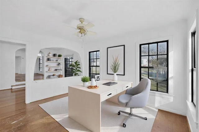 a dining room with furniture and window