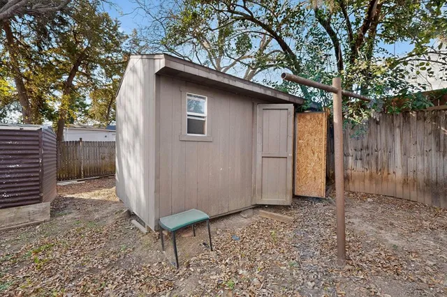 a backyard of a house with seating space