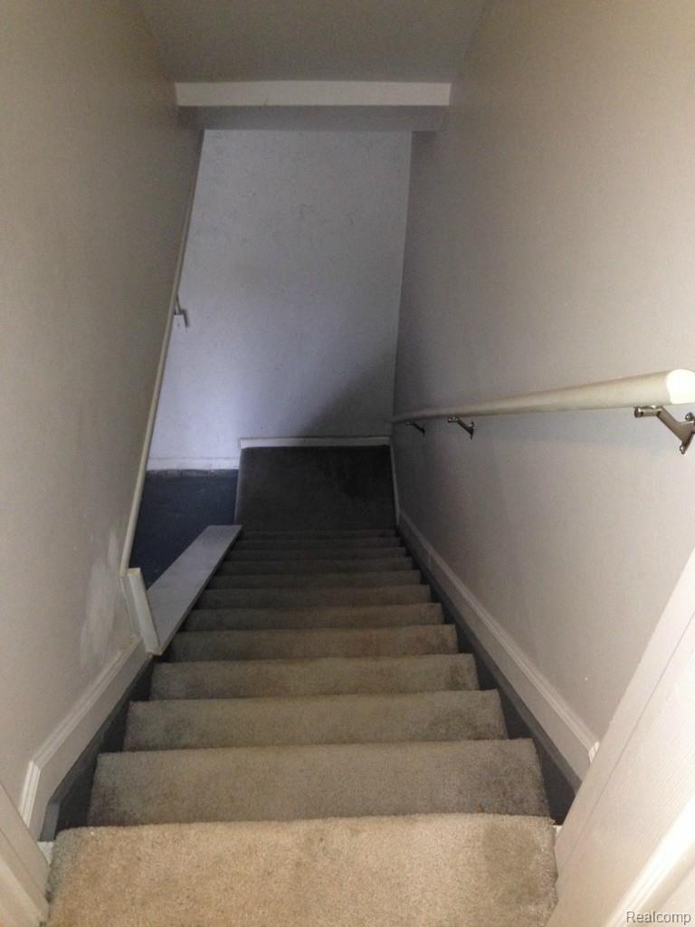 616 Rickett Road, Unit 109 Brighton, MI 48116 - Photo 27 of 38 Basement Stairs.jpg