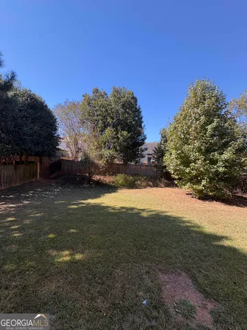 a view of outdoor space and yard