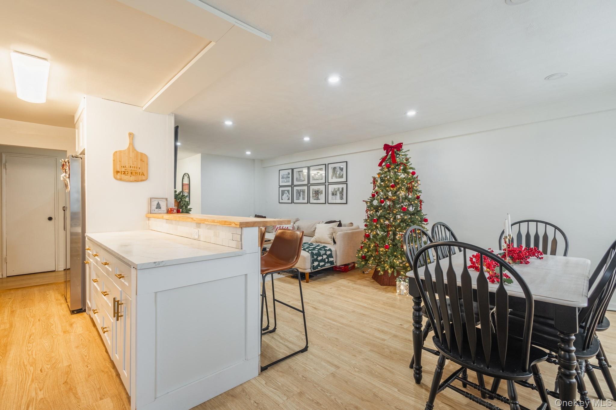 209-25 18th Avenue, Unit 3F Queens, NY 11360 - Photo 28 of 28 a view of a kitchen and dining room