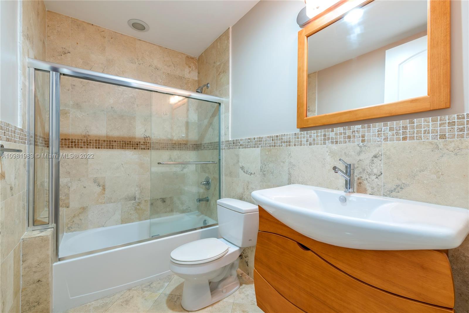 Spring Garden Miami, FL 33136 - Photo 15 of 39 a bathroom with a sink a toilet and shower