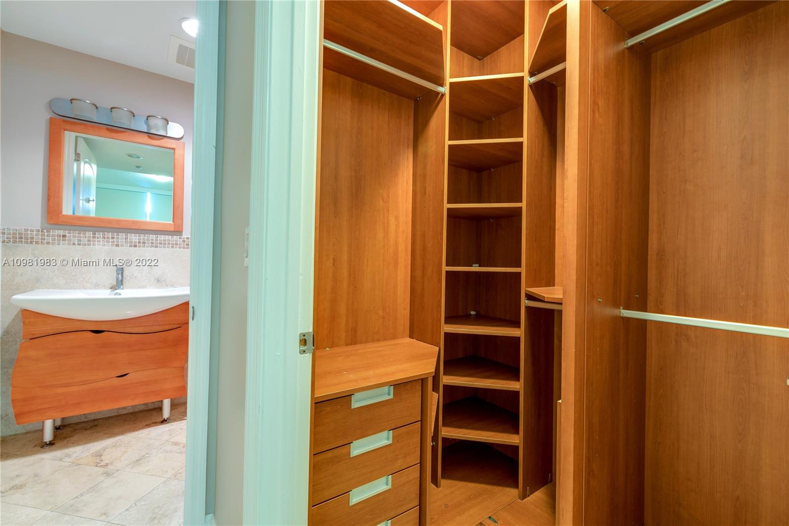 Spring Garden Miami, FL 33136 - Photo 22 of 39 a bathroom with a sink and a mirror