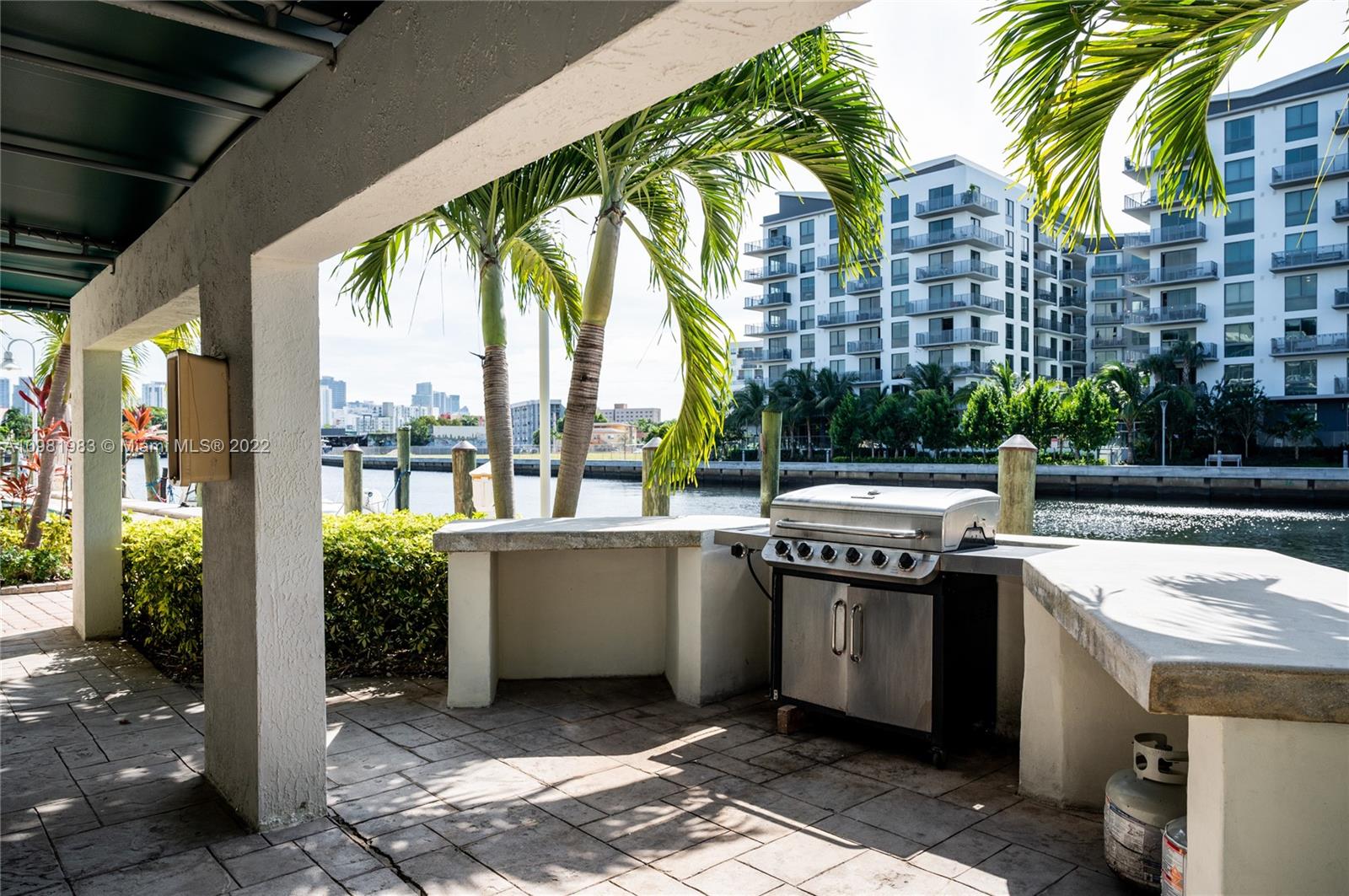 Spring Garden Miami, FL 33136 - Photo 29 of 39 a open kitchen with stainless steel appliances granite countertop a stove and a fountain
