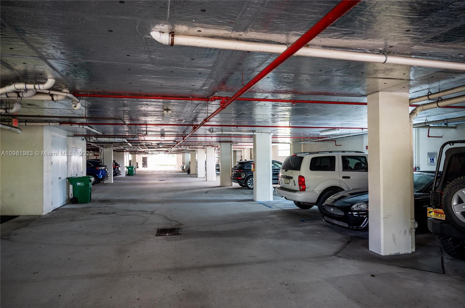 Spring Garden Miami, FL 33136 - Photo 34 of 39 a view of parking garage with cars