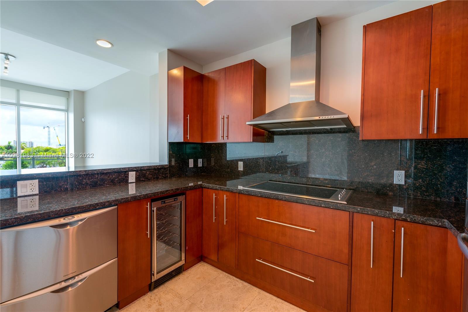 Spring Garden Miami, FL 33136 - Photo 4 of 39 a kitchen with stainless steel appliances granite countertop a sink and a stove