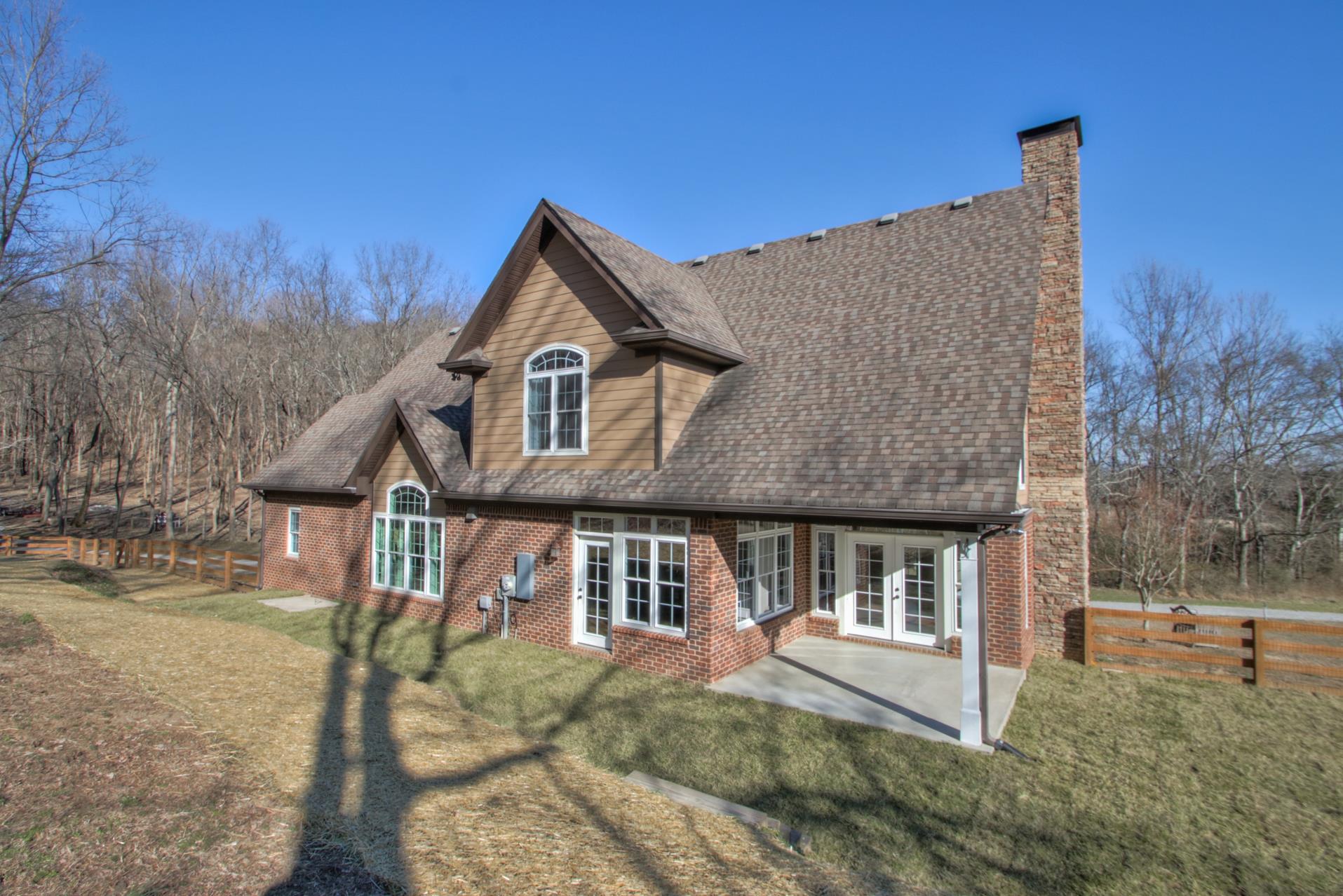 175 Holloway Road Lebanon, TN 37090 - Photo 4 of 30 a view of a house with a yard balcony and large tree