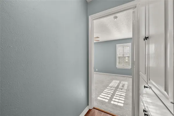 a view of front door with wooden floor