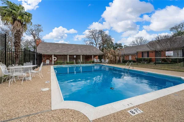 a view of a house with swimming pool