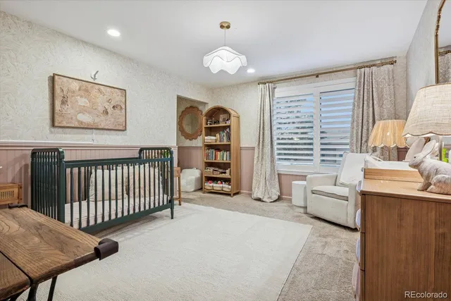 a view of a livingroom with furniture and a window