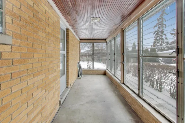 a view of a room with windows