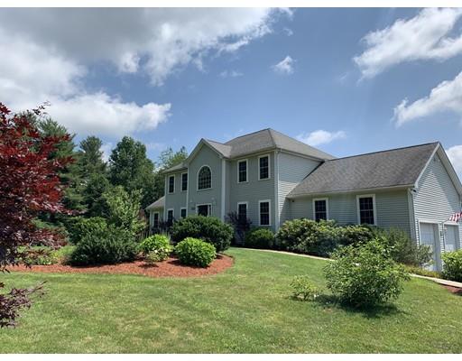 233 Pleasantdale Road Rutland, MA 01543 - Photo 3 of 41 a view of a house with backyard and garden