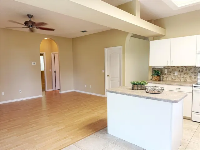 a view of a kitchen cabinets and a sink