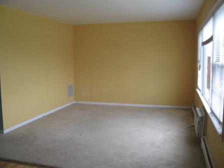 7531 Roberts Road, Unit 2B Bridgeview, IL 60455 - Photo 3 of 7 a view of an empty room and a window