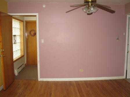 7531 Roberts Road, Unit 2B Bridgeview, IL 60455 - Photo 4 of 7 an empty room with a window