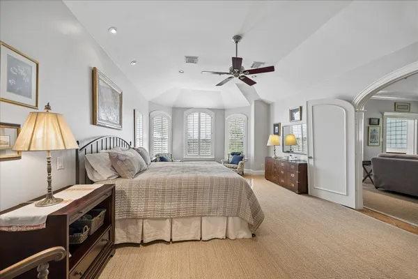 a view of a livingroom with furniture and flat screen tv