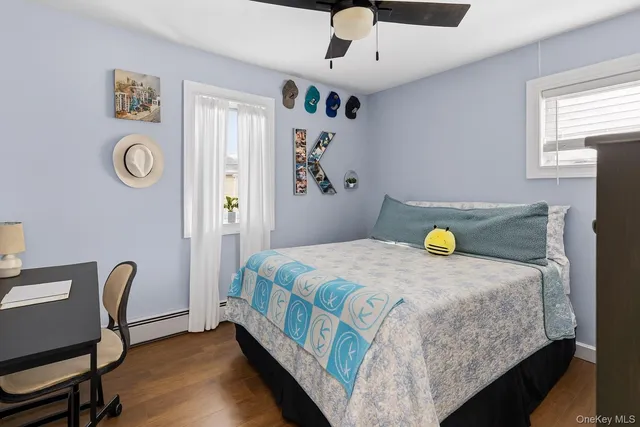 a bedroom with a bed and a table in it