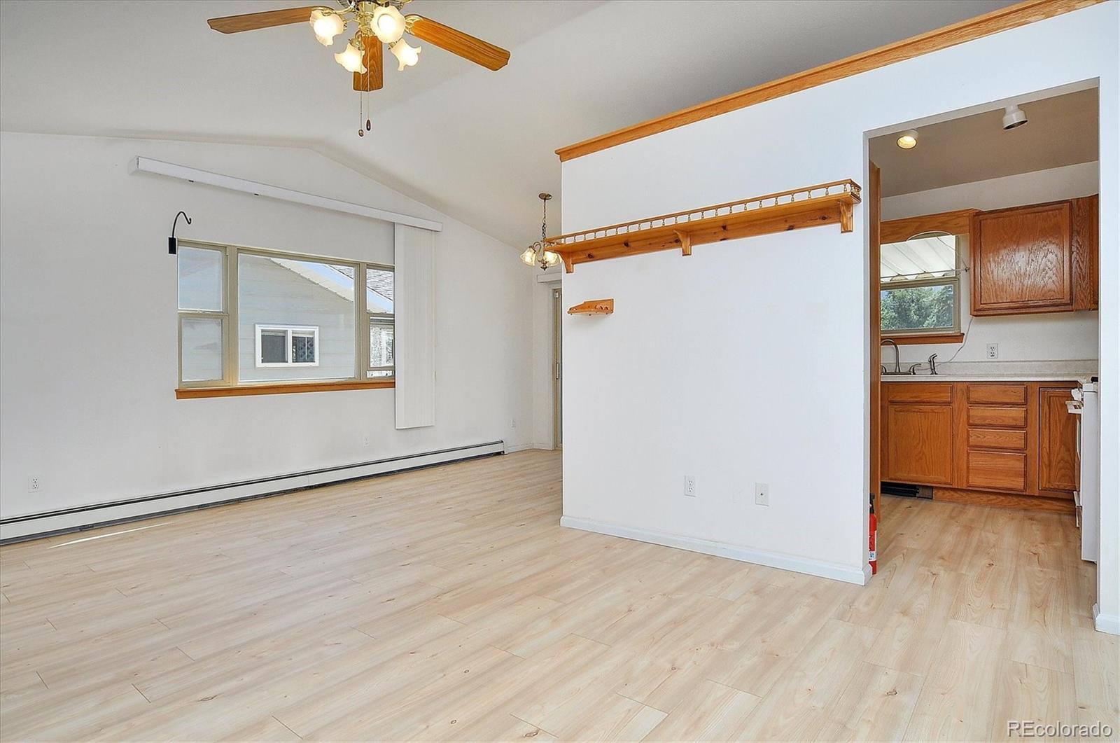 29 Rex Circle Salida, CO 81201 - Photo 11 of 31 wooden floor in an empty room with a window
