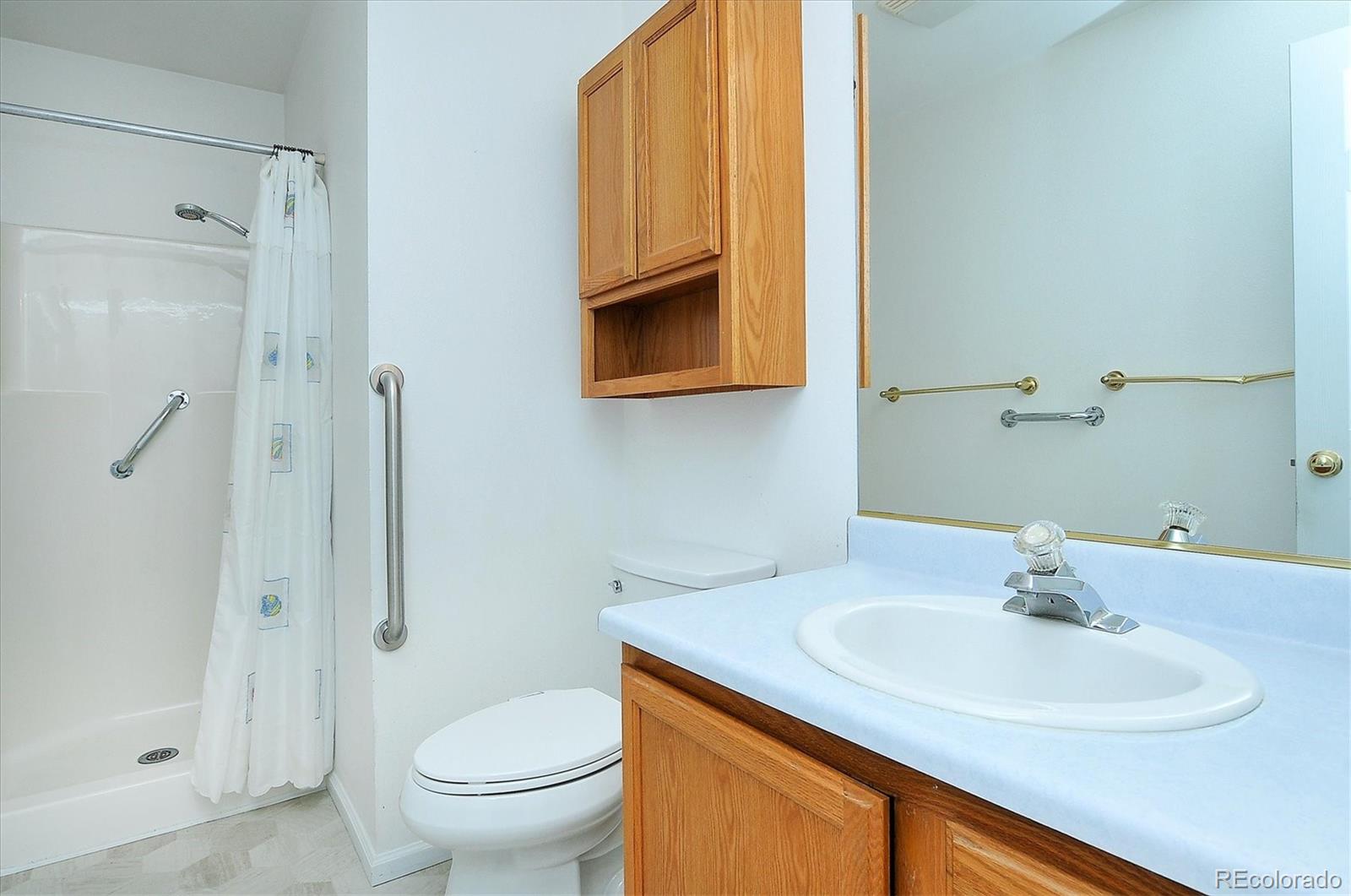 29 Rex Circle Salida, CO 81201 - Photo 18 of 31 a bathroom with a sink toilet and shower