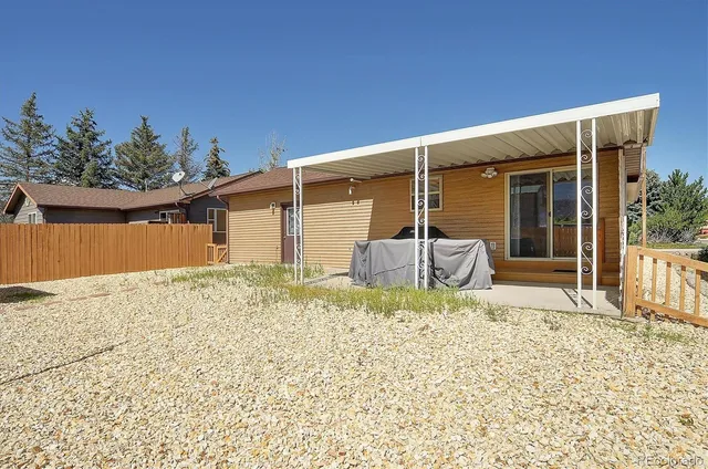 a house with trees in front of it