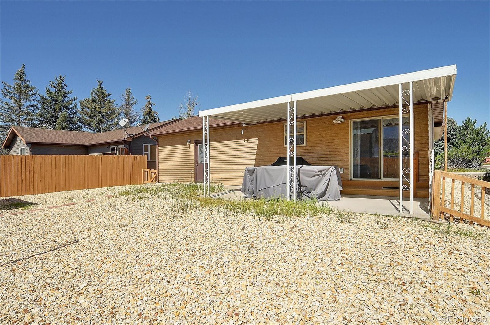 29 Rex Circle Salida, CO 81201 - Photo 25 of 31 a house with trees in front of it