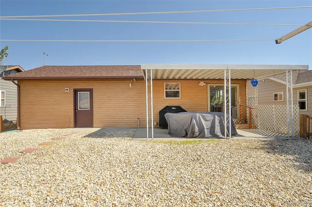 a view of a bedroom with a large bed and a window