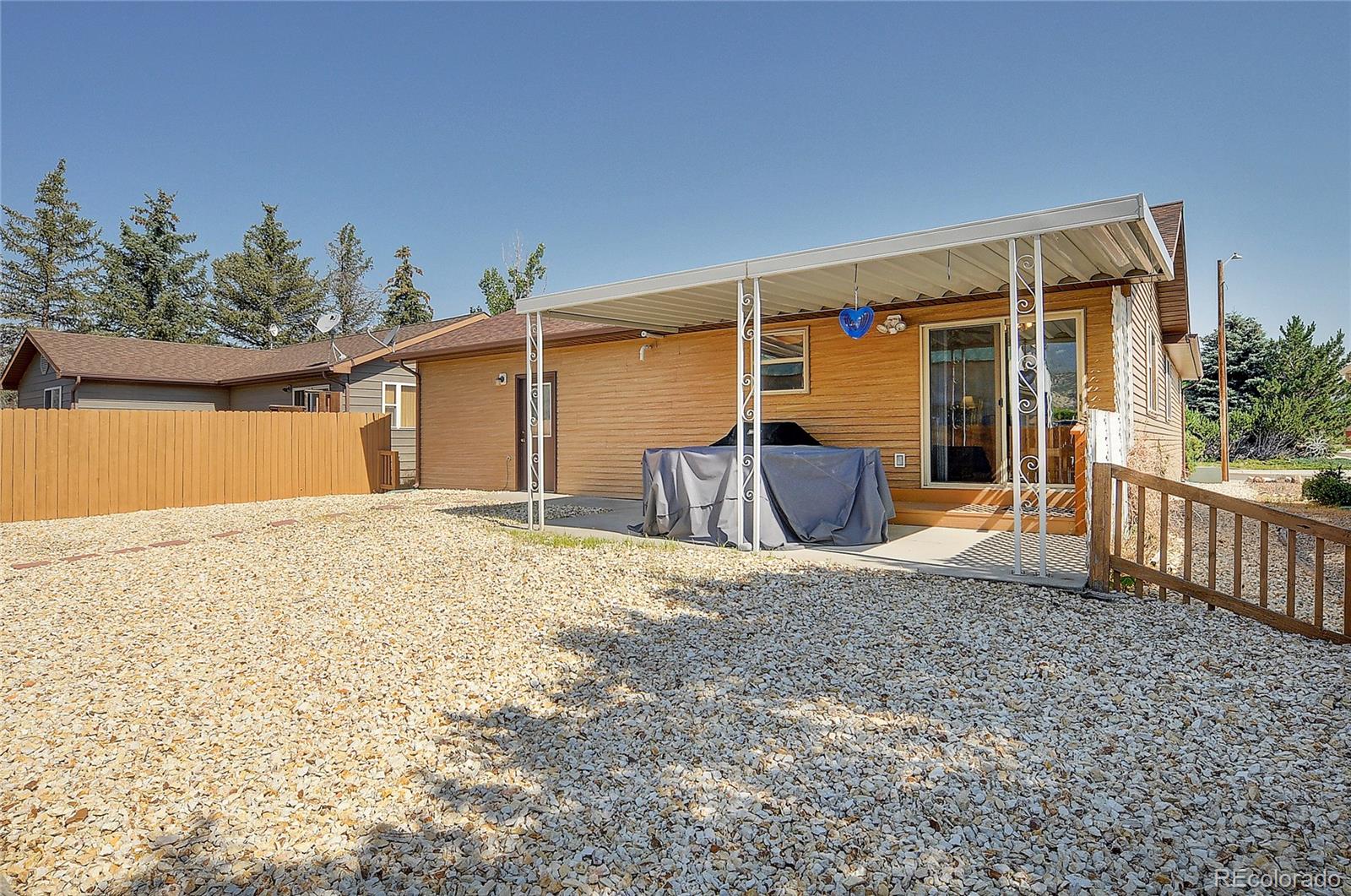 29 Rex Circle Salida, CO 81201 - Photo 31 of 31 a front view of a house with a yard and garage