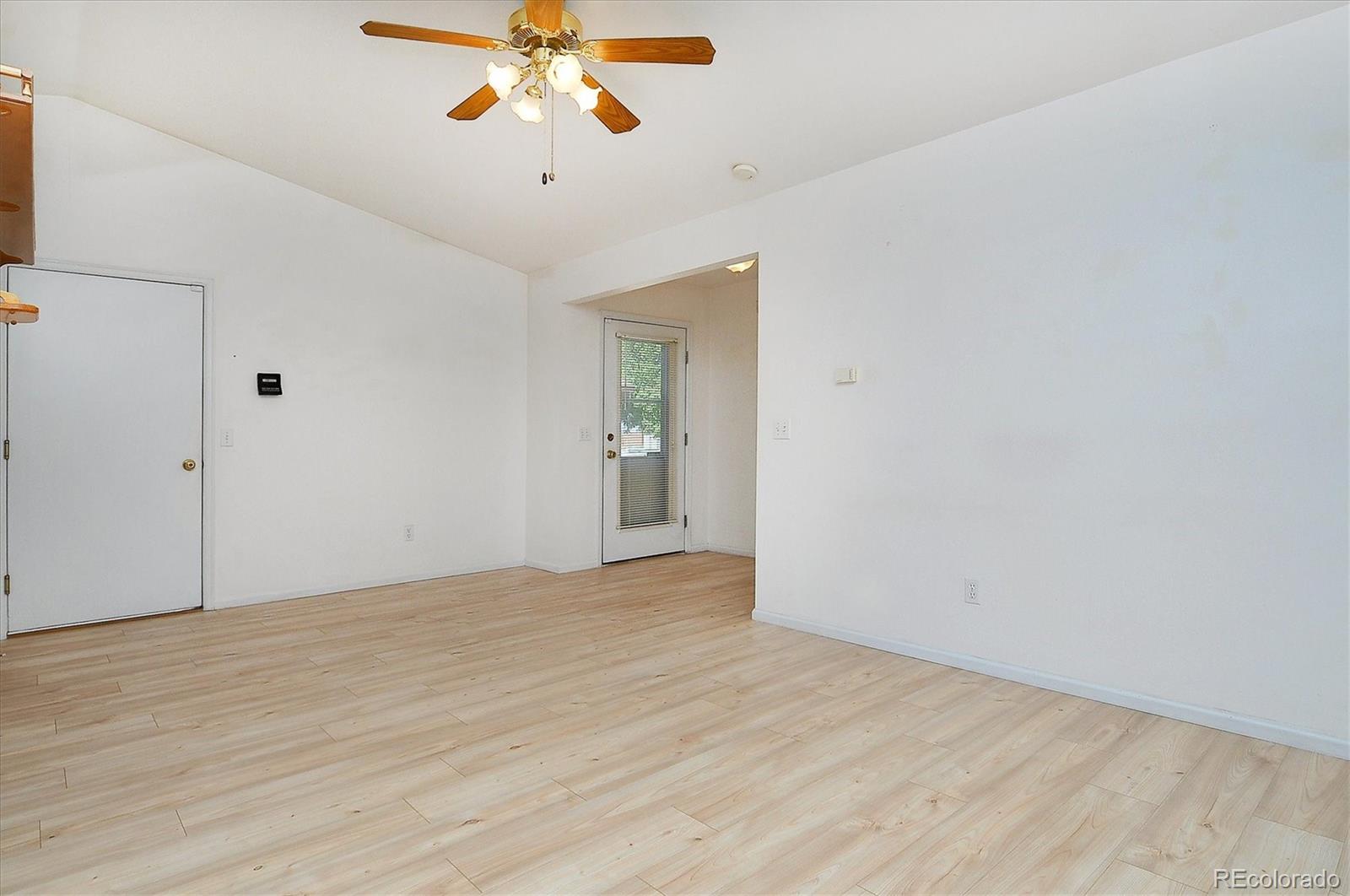 29 Rex Circle Salida, CO 81201 - Photo 5 of 31 a view of an empty room and chandelier fan