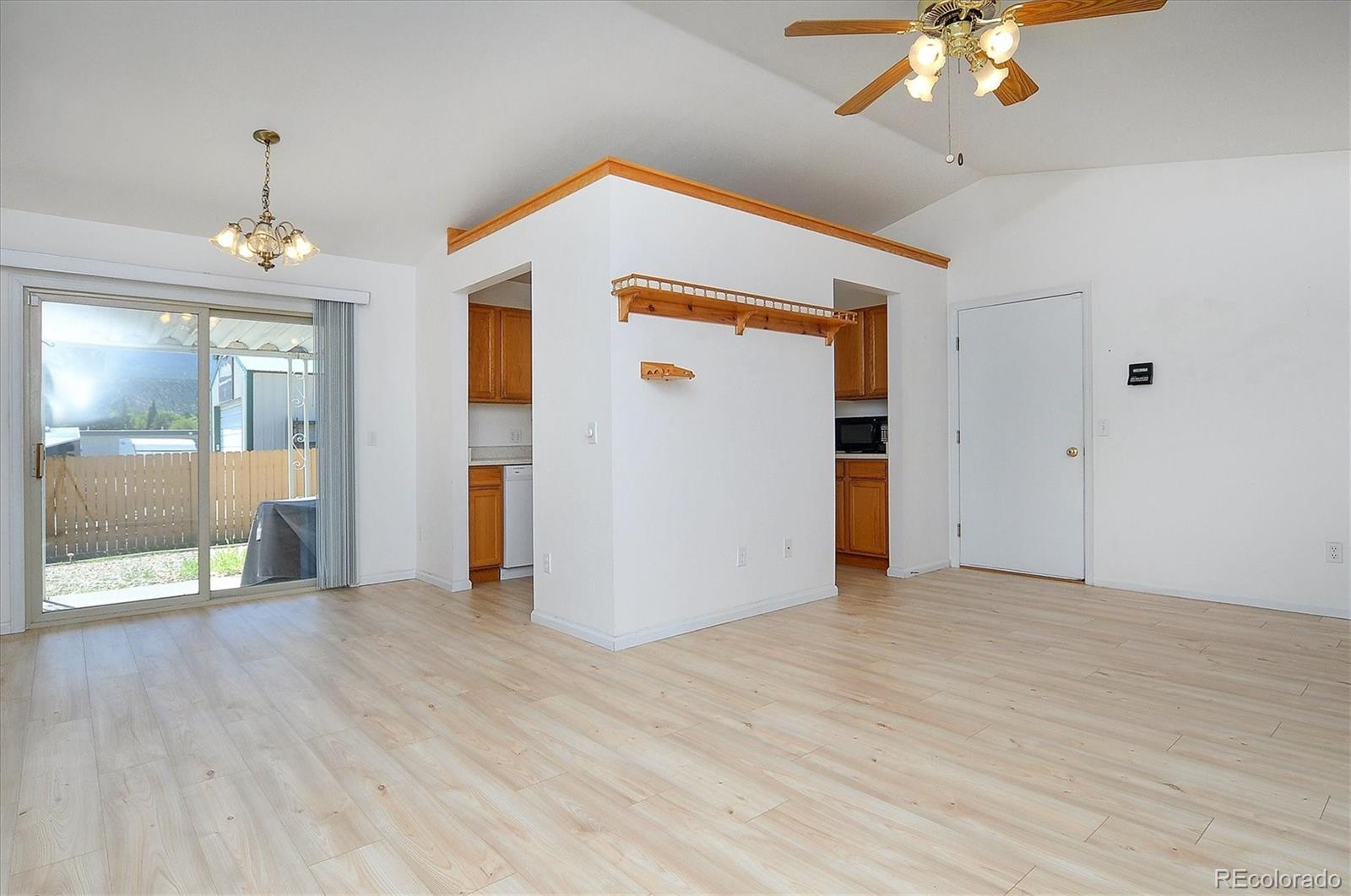 29 Rex Circle Salida, CO 81201 - Photo 6 of 31 wooden floor in an empty room with a window
