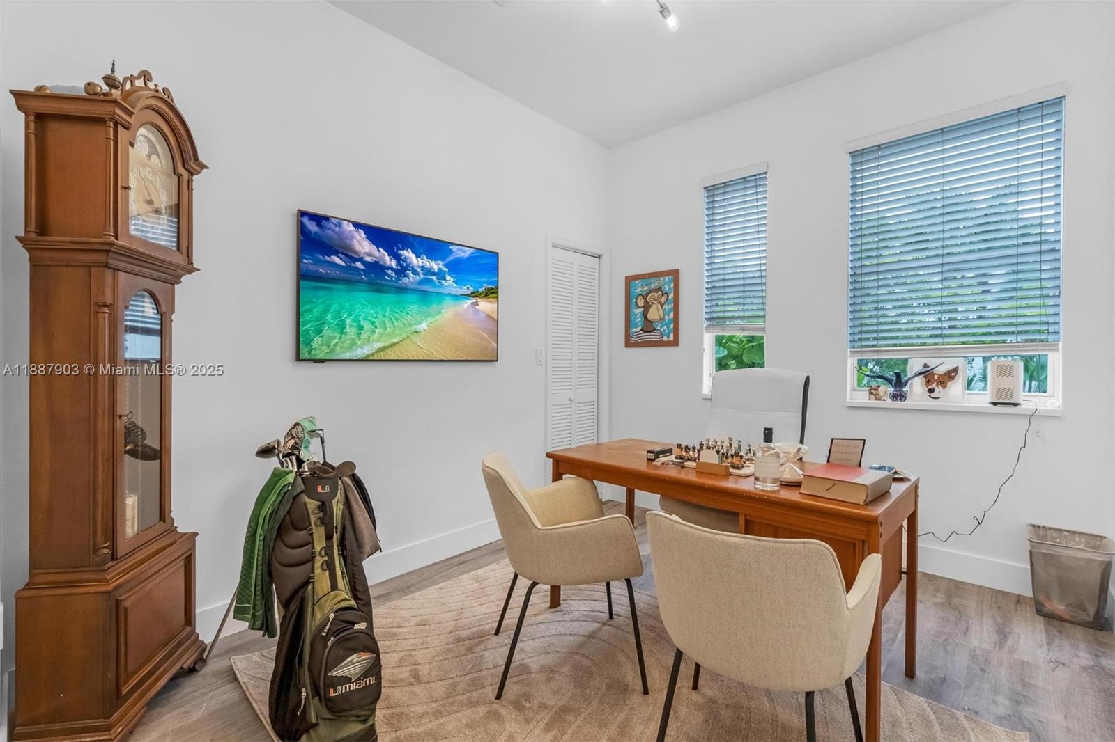 3067 Center Street, Unit 17 Miami, FL 33133 - Photo 11 of 21 a dining room with furniture and window