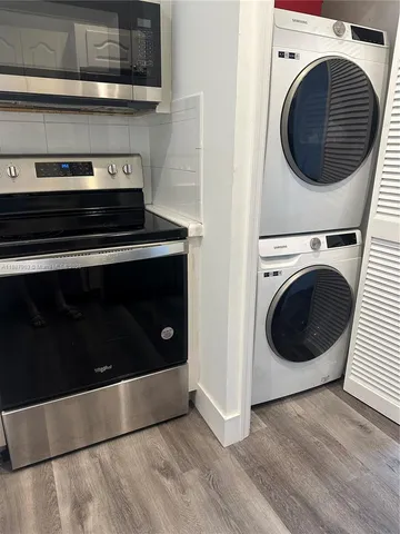 a view of washer and dryer in a utility room