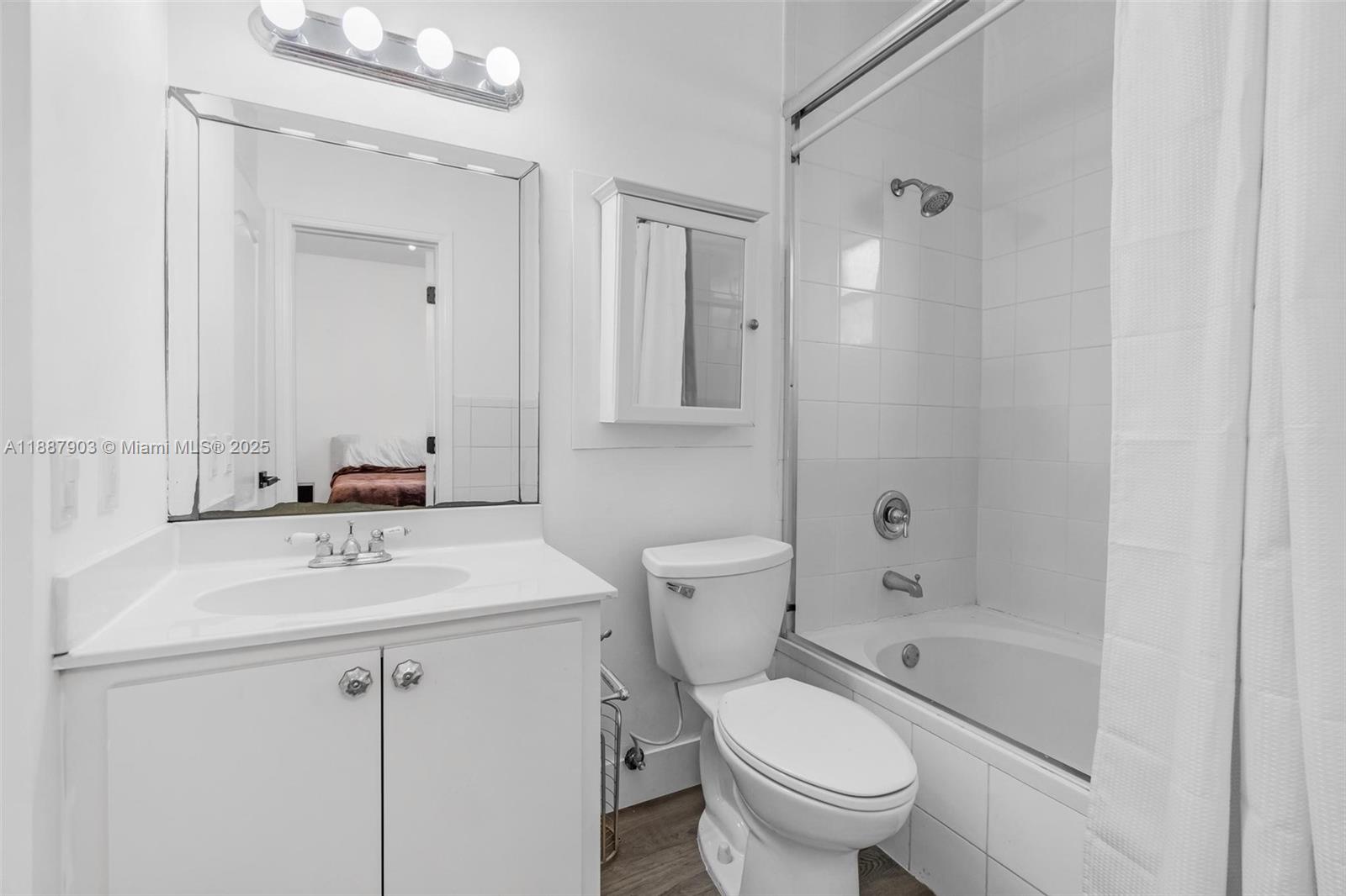 3067 Center Street, Unit 17 Miami, FL 33133 - Photo 10 of 21 a bathroom with a sink toilet and shower