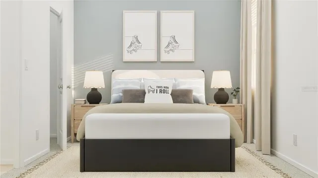 a bedroom with bed and a window