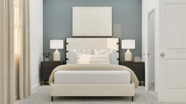 a living room with furniture and a lamp