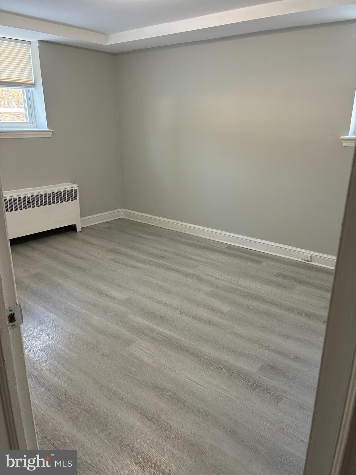 1800 Garrett Road, Unit B1 Lansdowne, PA 19050 - Photo 7 of 8 a view of an empty room and window