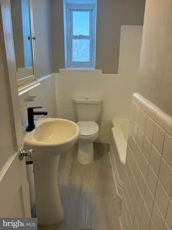 a bathroom with a sink and a toilet