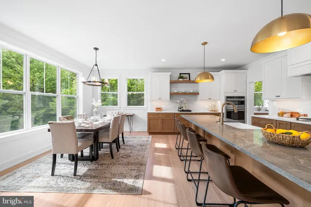 a spacious bedroom with a bed and a couch